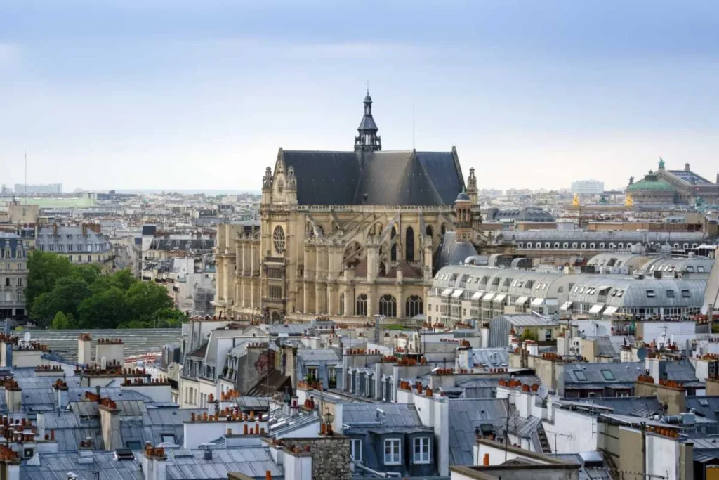Paris skyline with historic church and classic rooftops in France