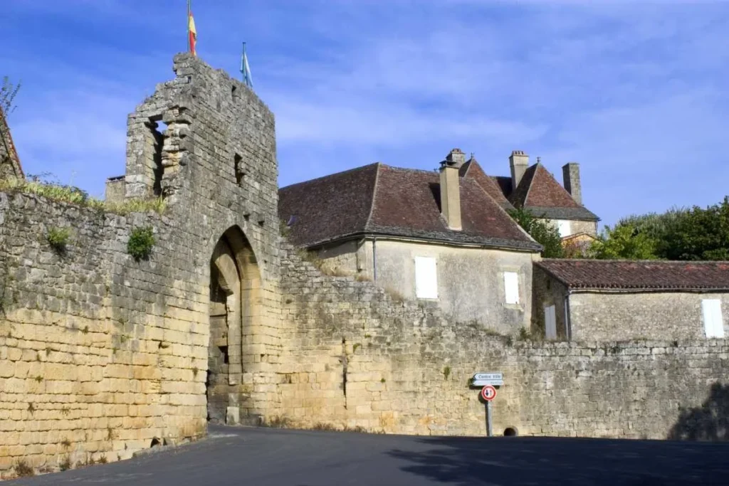 Medieval stone gate near a prehistoric cave site in France