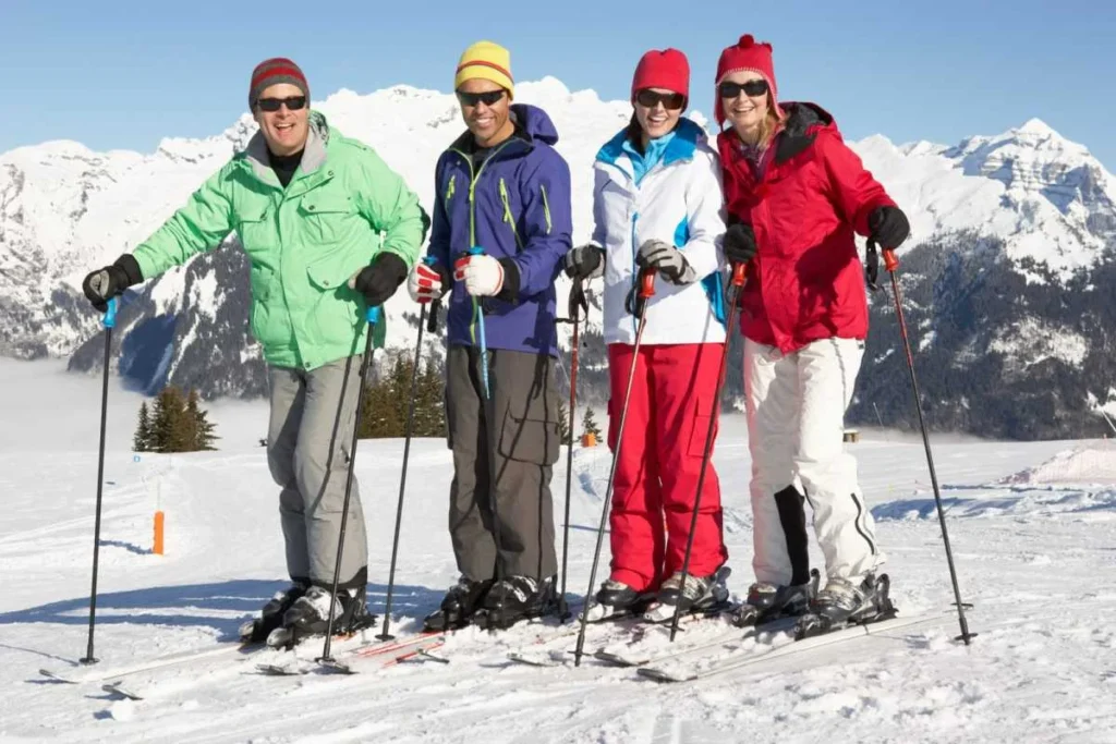 Group of skiers on a snowy mountain in the French Alps
