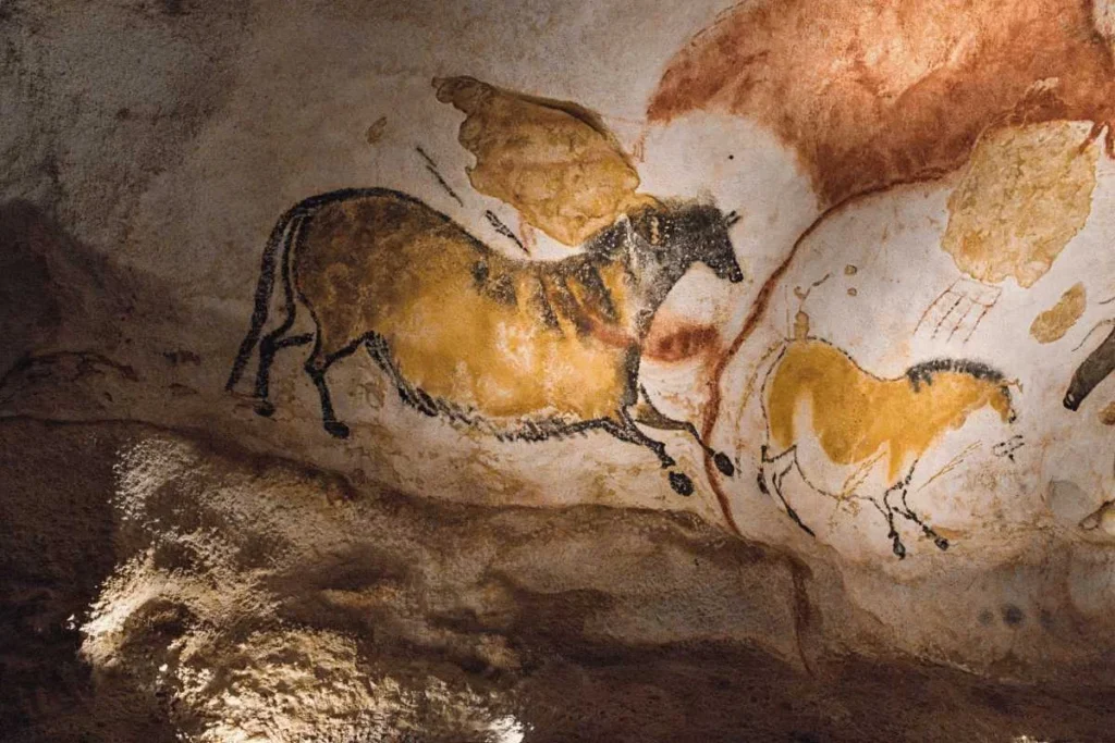 Prehistoric cave paintings on a rock ceiling in France