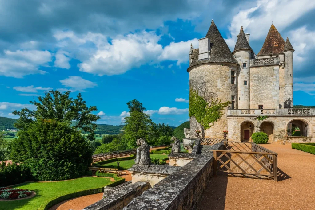Château des Milandes with landscaped gardens and terraces overlooking the Dordogne countryside