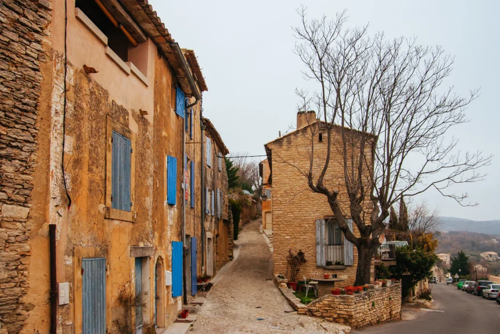 Traditional Provence village street with stone houses and narrow path