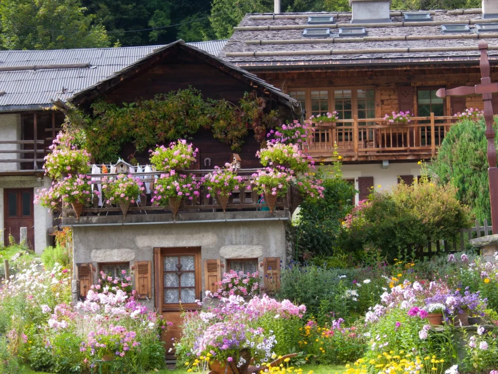 Flower-filled alpine guesthouse with wooden balconies