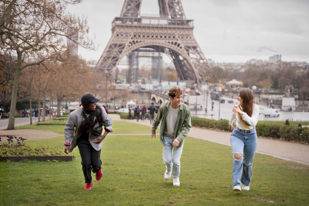 Friends walking near the Eiffel Tower in Paris