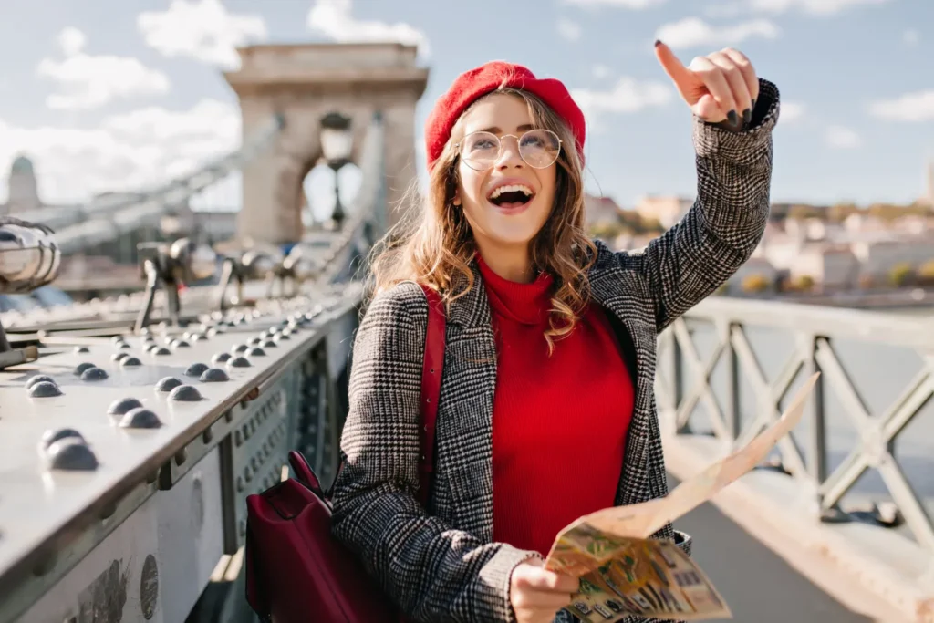 Tourist exploring France with a map