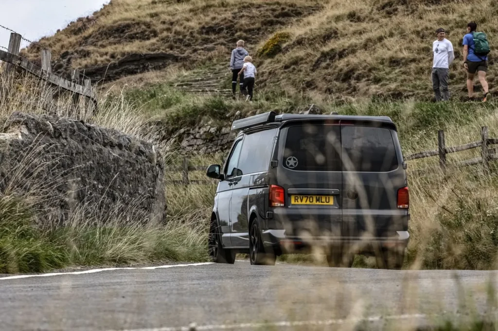 Camper van on a narrow countryside road