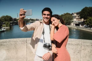 Couple taking selfie in Paris