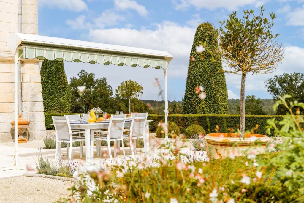 Outdoor dining terrace at a French château