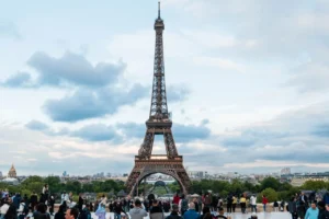 Eiffel Tower with tourists in Paris
