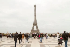 Tourists visiting the Eiffel Tower in Paris