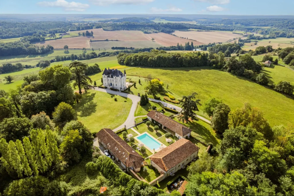 Aerial view of a chateau estate in rural France