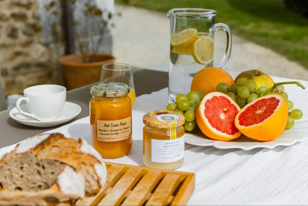 French breakfast with fruit and honey