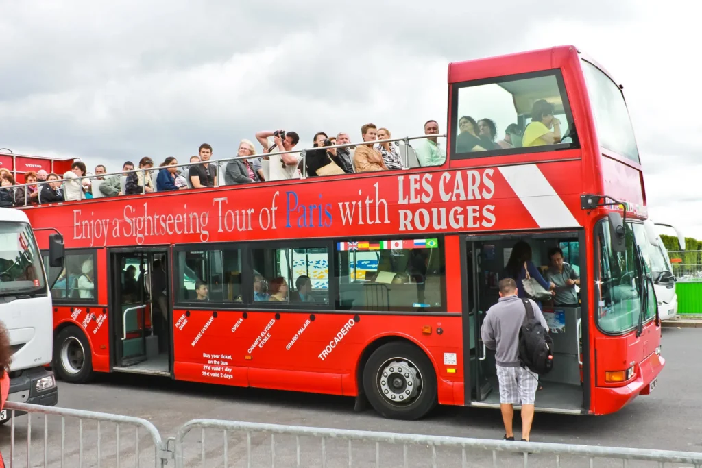 Red double-decker sightseeing bus in Paris