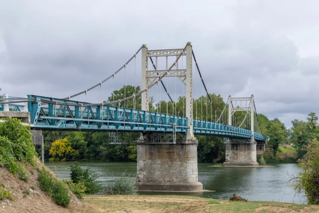 Auvillar suspension bridge spanning the Garonne River in Occitanie