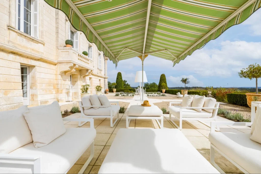 Château terrace with outdoor seating and views