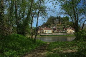 Riverside village houses and historic buildings along the Dordogne River