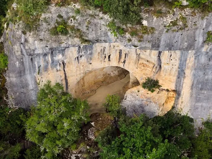 Aerial view of a limestone rock shelter in Dordogne